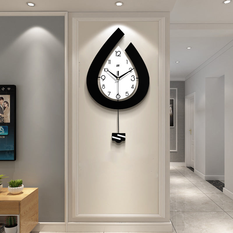 Waterdruppel wandklok - Metalen slinger en stil uurwerk