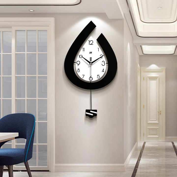 Waterdruppel wandklok - Metalen slinger en stil uurwerk