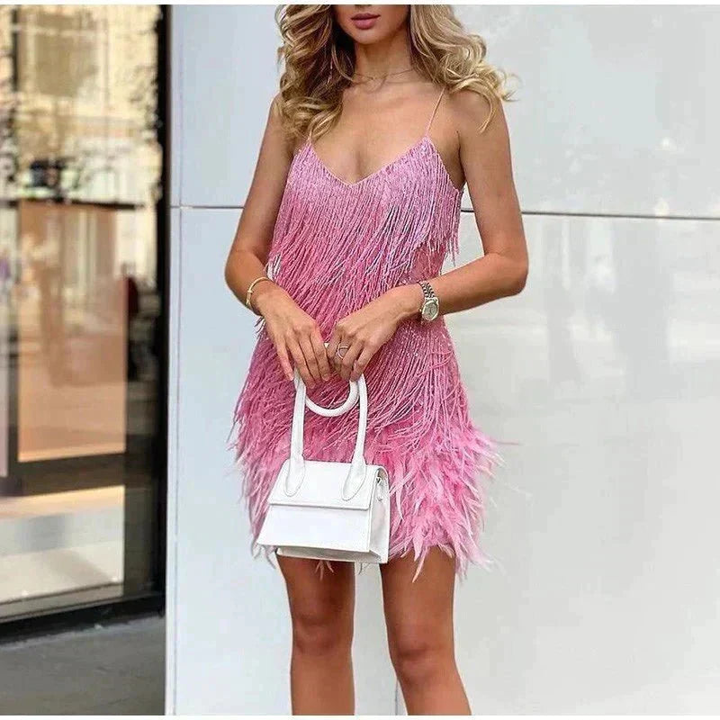 Mini-jurk met pailletten en veerachtige afwerking